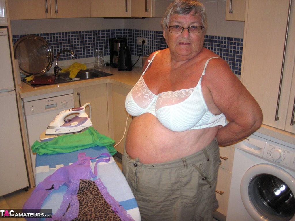 Overweight British oma Grandma Libby exposes her boobs while ironing porn photo #424565841
