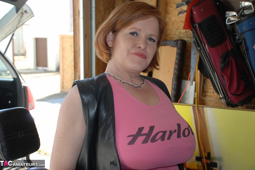 Older redheaded Misha MILF displays her big tits and bare ass on a motorcycle порно фото #425422866
