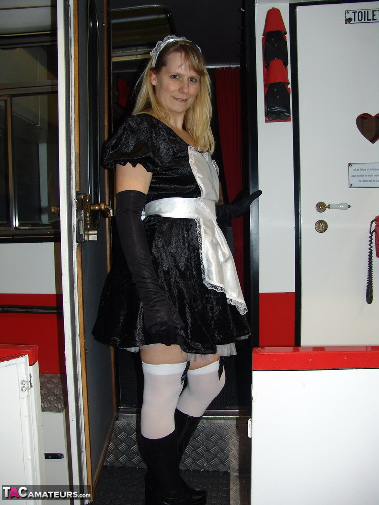 Blonde maid Sweet Susi takes off her uniform while inside a motorhome 色情照片 #425163037