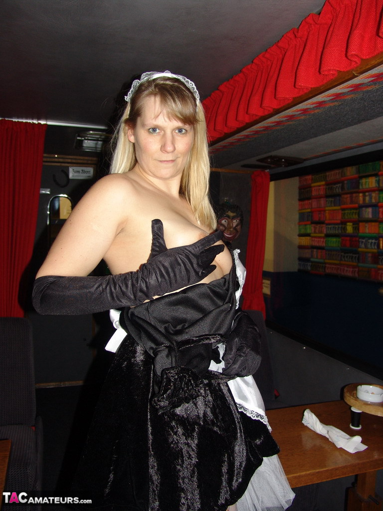 Blonde maid Sweet Susi takes off her uniform while inside a motorhome zdjęcie porno #425163052