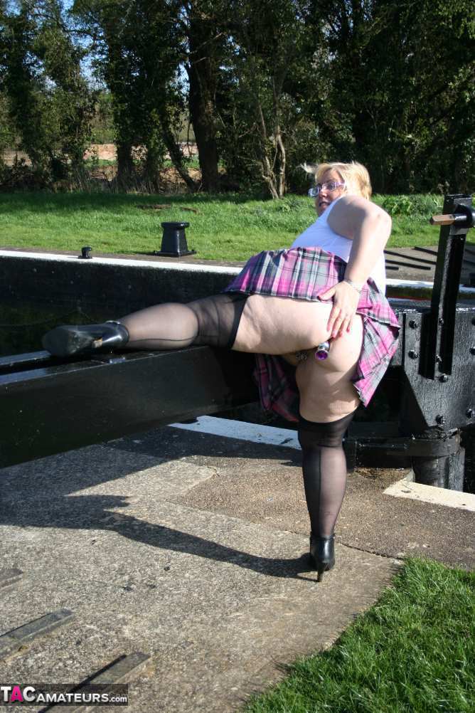 Overweight blonde Lexie Cummings exposes herself by locks on a canal system foto porno #424140687