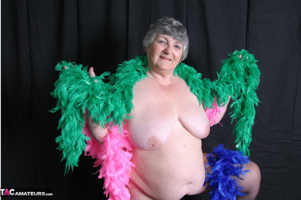 Large breasts are displayed by fat British grandmother, Grandma Libby.