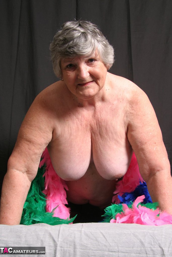 Fitter body hair and feather boas prompt Grandma Libby from the UK to flaunt her large fists.