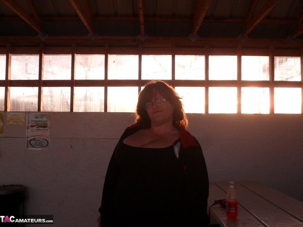Overweight redhead Misha MILF exposes her tits & twat inside a building порно фото #425910504