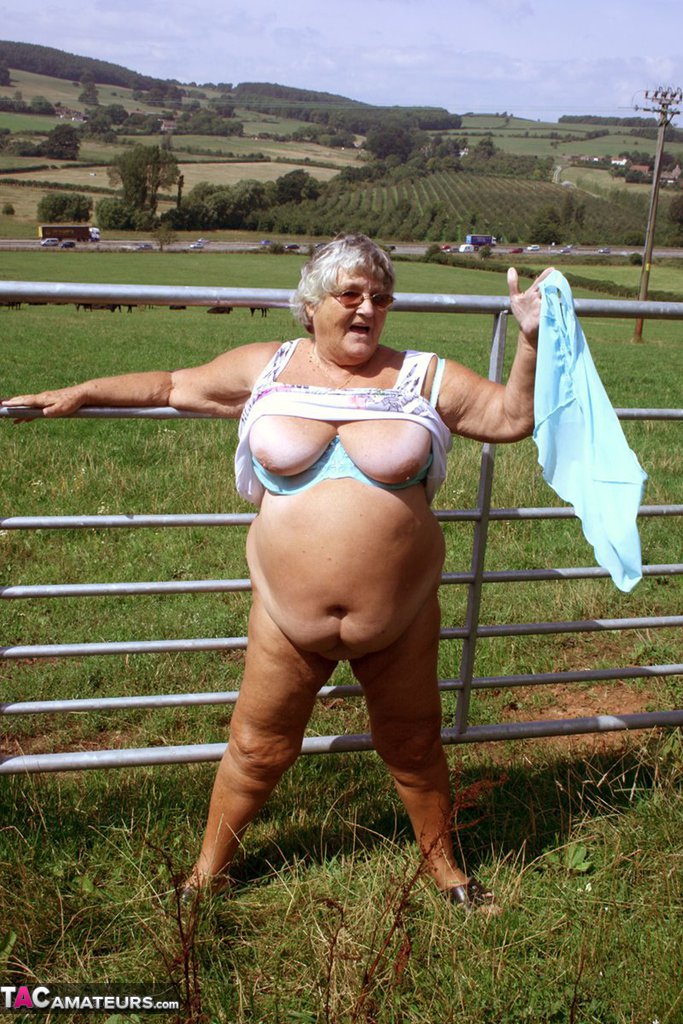Old British Woman Grandma Libby Exposes Herself Next To A Field Of Cattle