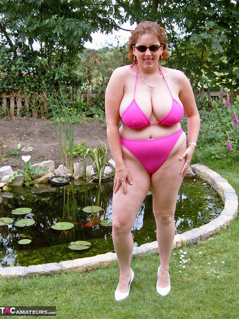 Brazen mature fatty Curvy Claire sheds bikini in the backyard to finger fuck porn photo #427486548