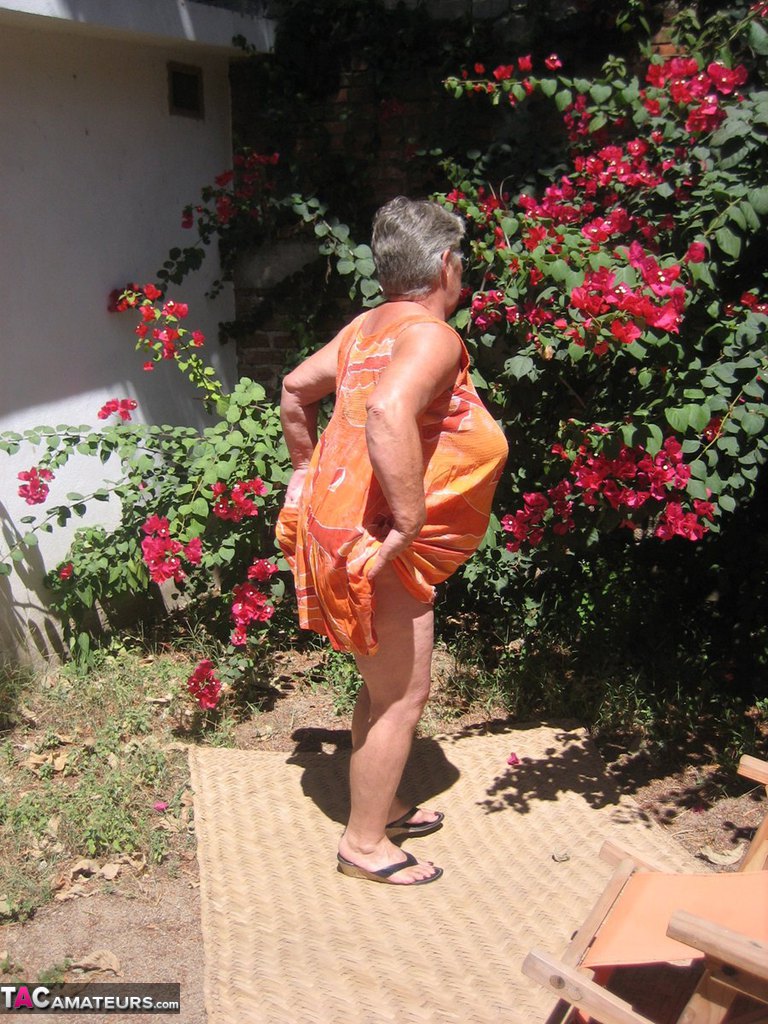 Obese Granny Girdle Goddess Strips To Her Sandals On Garden Patio