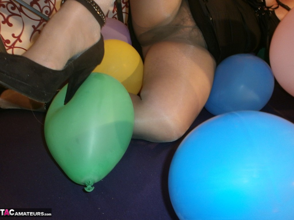 Hot Granny Caro In Shiny Sheer Pantyhose Heels Crushing Balloons On Her Bed