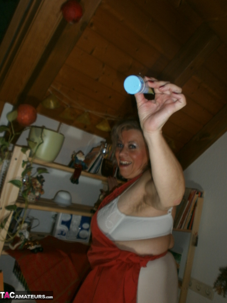 Horny Oma Caro Pleasures Her Pussy With A Wooden Spoon And A Cucumber