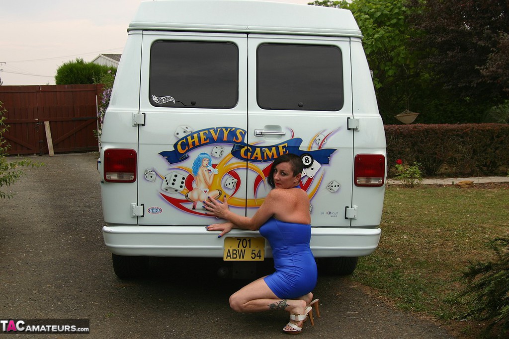 Mature amateur Mary Bitch gets naked inside a B-class van during solo action porn photo #425845260
