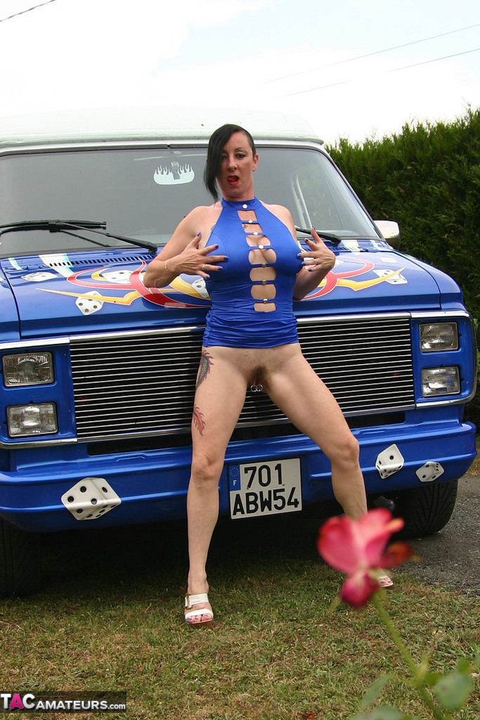 Mature amateur Mary Bitch gets naked inside a B-class van during solo action porn photo #425845268