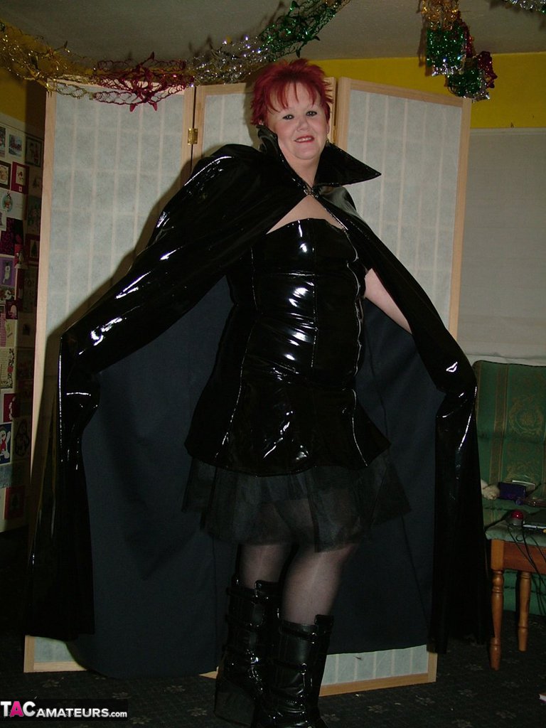 Mature redhead Valgasmic Exposed exposes herself in cosplay attire by a shed foto porno #423232838