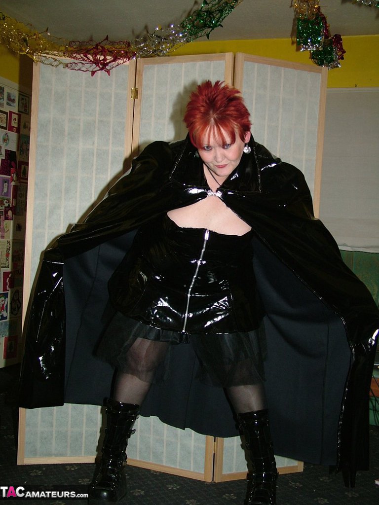 Mature redhead Valgasmic Exposed exposes herself in cosplay attire by a shed foto porno #423232899