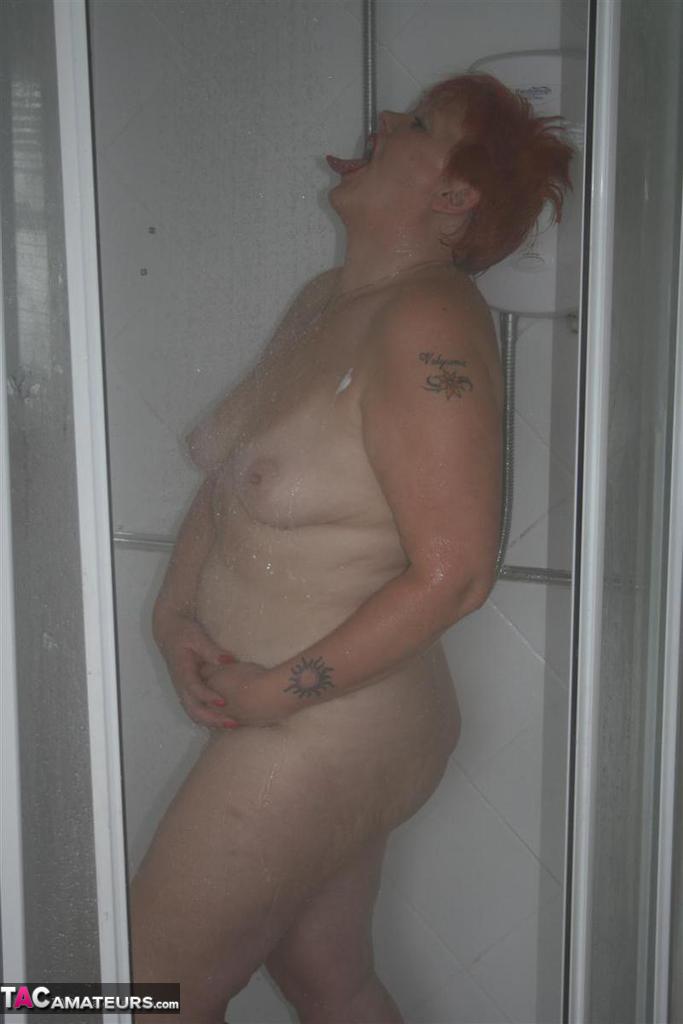Mature redhead Valgasmic Exposed gets caught totally naked while in the shower porn photo #426535918