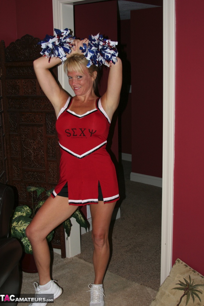 Blonde cheerleader Jayme Lawrence disrobes before a blowjob in riding a cock porn photo #422882543