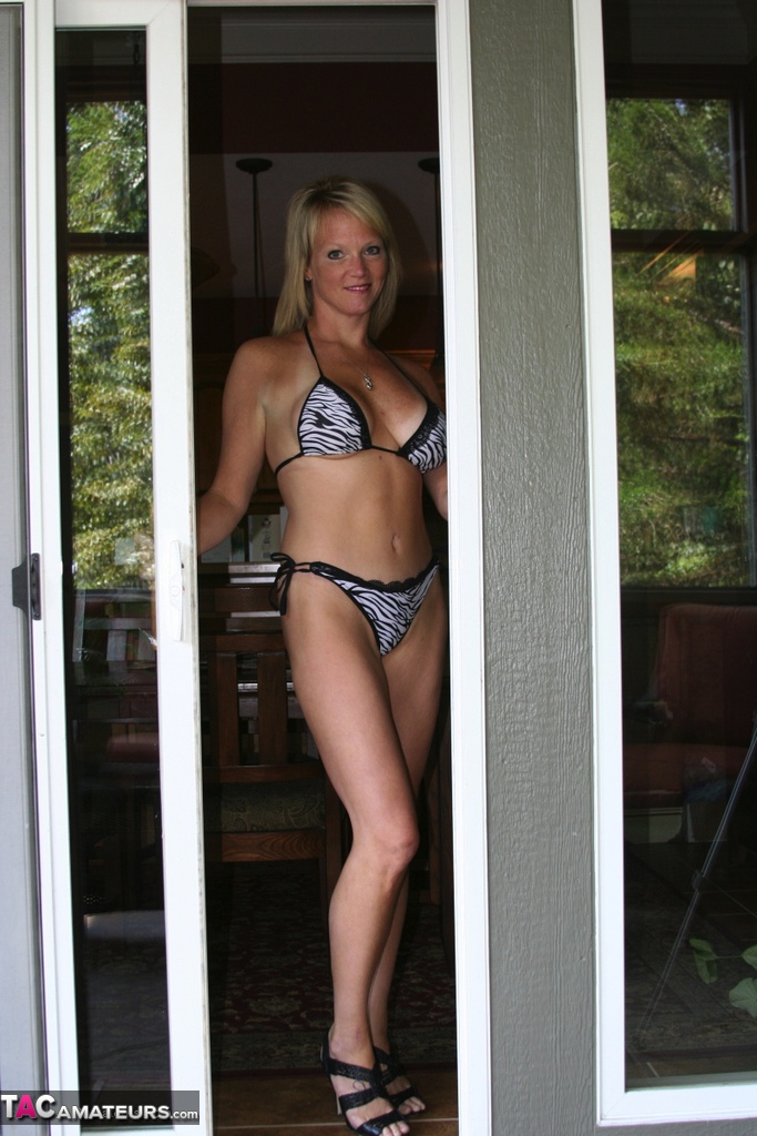 Blonde amateur Jayme Lawrence masturbates in a bikini before a hard fuck porn photo #424679308