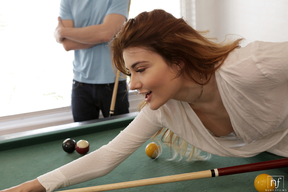 Young redhead gets fucked by a large cock on top of a pool table photo porno #427816206