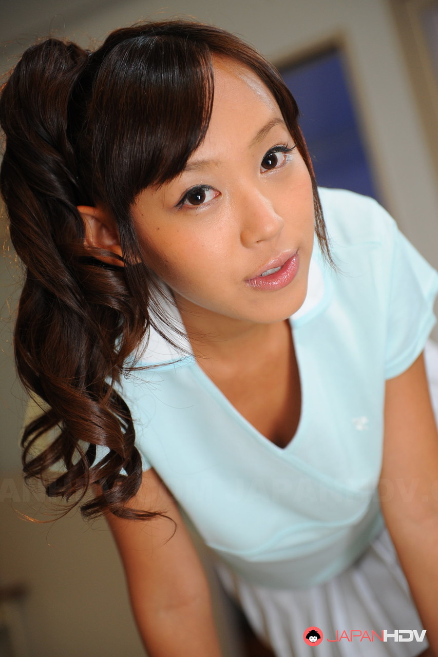 Pigtailed Asian cutie Nagisa posing in her lovely outfit on the cam porn photo #426350349