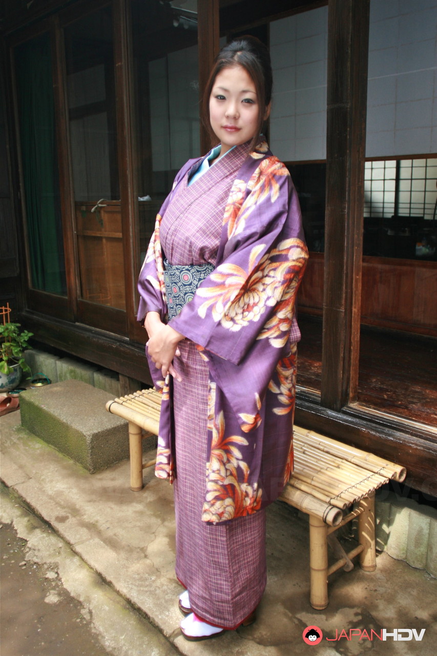 A Japanese female wears a no panty upskire and pulls it off on the patio.