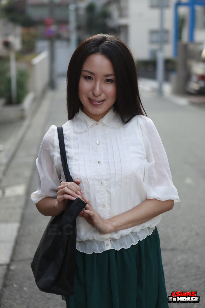 Japanese schoolgirl Anna Sakura pauses in the street to flaunt her hot beauty porn photo #426983351