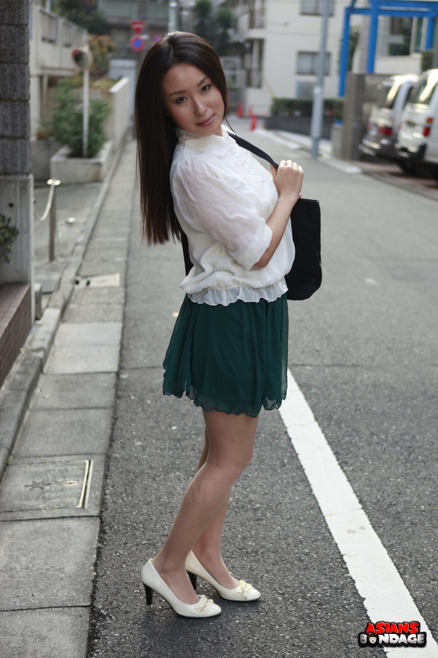 Japanese schoolgirl Anna Sakura pauses in the street to flaunt her hot beauty porn photo #426639453