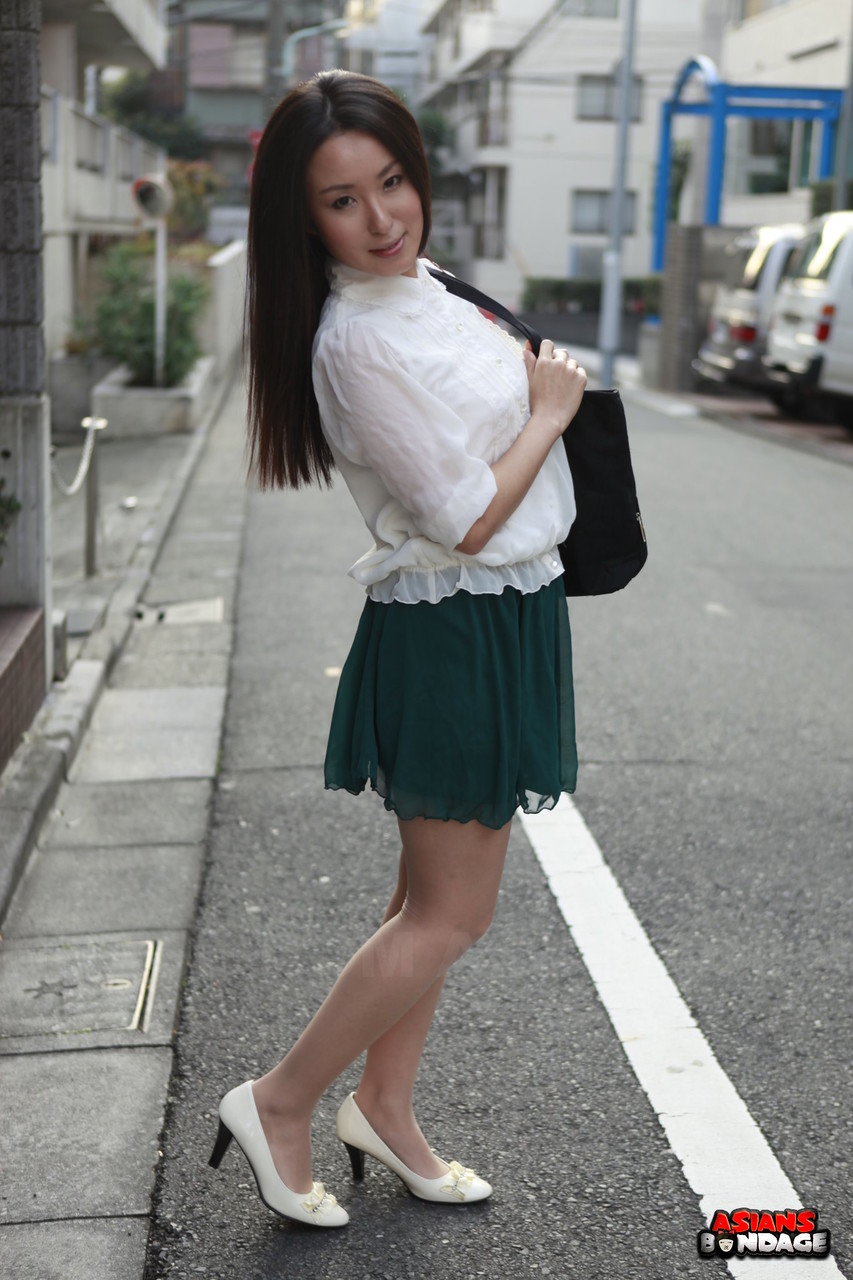 Japanese schoolgirl Anna Sakura pauses in the street to flaunt her hot beauty porn photo #426983424