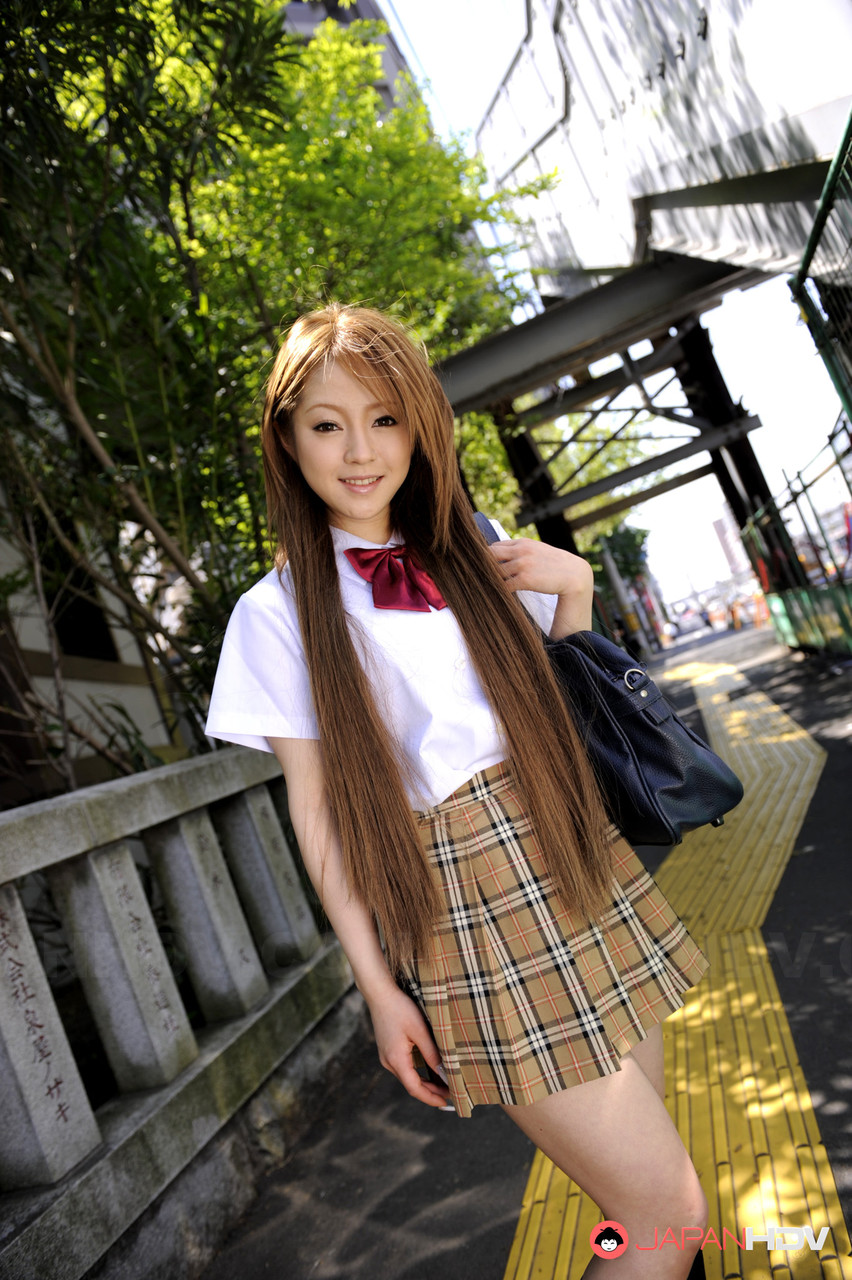 Innocent Japanese schoolgirl Ria Sakurai flashes sexy white panties in public porn photo #425376793