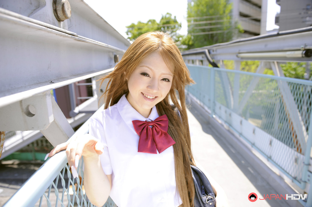 Innocent Japanese schoolgirl Ria Sakurai flashes sexy white panties in public porn photo #425376797
