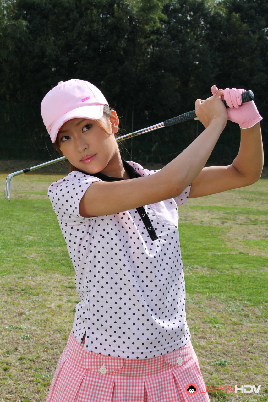 Young Japanese golfer Nao Yuzumiya flashes a no panty up skirt on the course porn photo #428240520