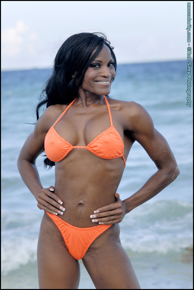 Ebony Bodybuilder Debra Dunn Poses At The Ocean In A String Bikini