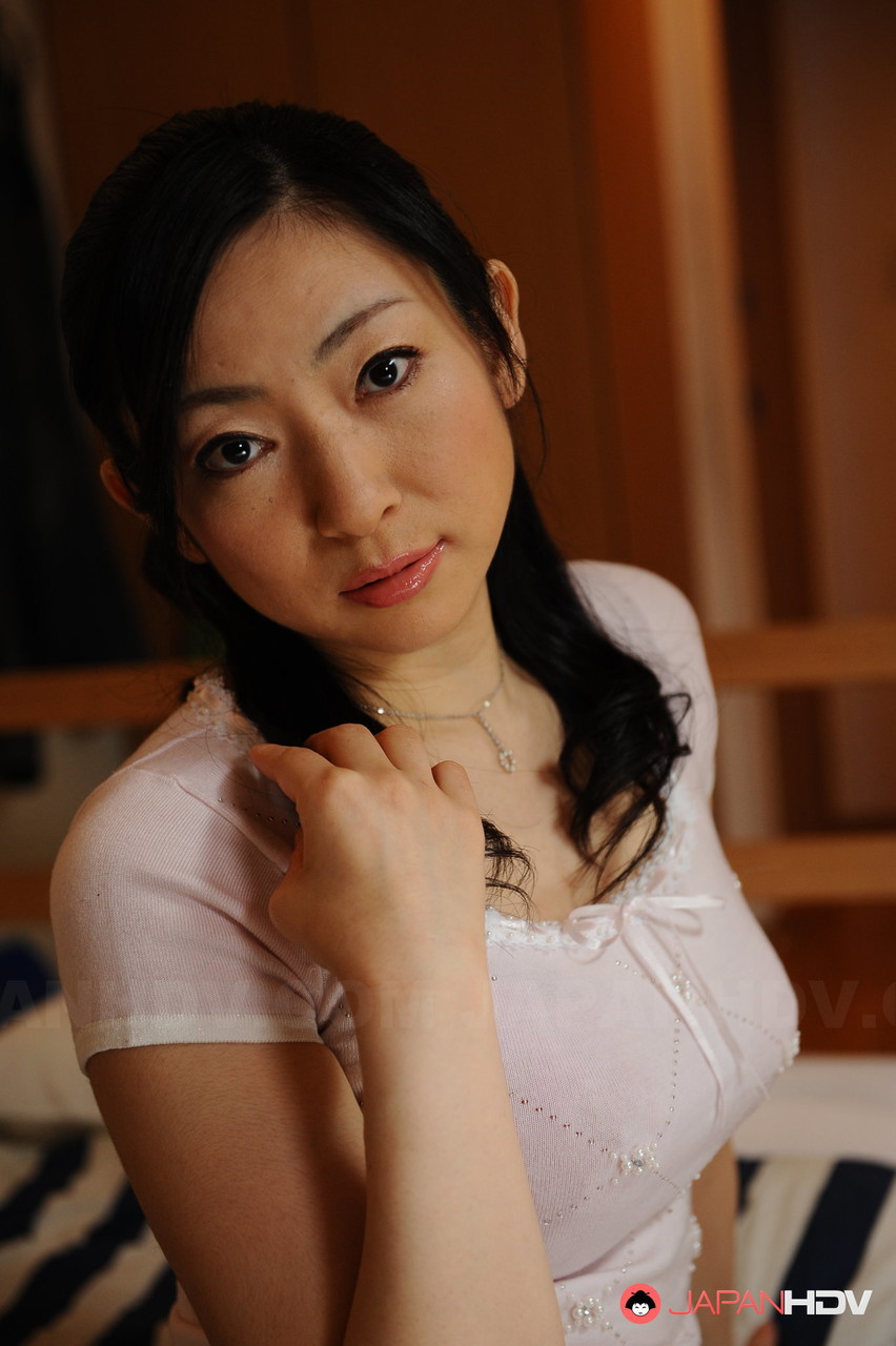 Slender mature Japanese woman Emiko Koike bends over to pose in white dress ポルノ写真 #424269774