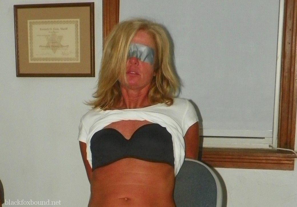 Blonde female is tied up with rope after being blindfolded and gagged porn photo #424891003