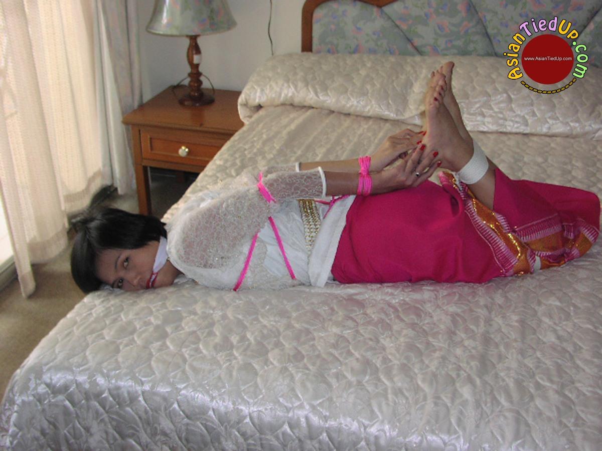 Bad Vacation of a Stupid Asian She is Left Hogtied and Gagged porn photo #428141449