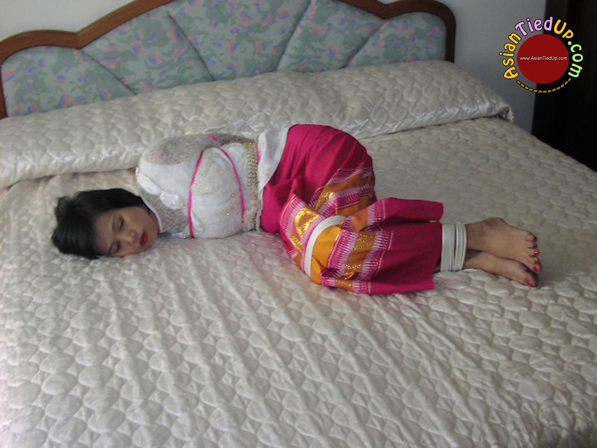 Bad Vacation of a Stupid Asian She is Left Hogtied and Gagged porn photo #428141473