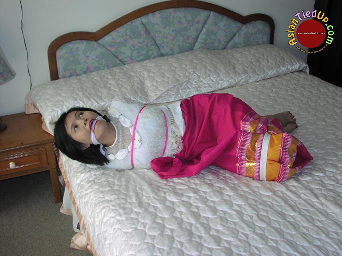 Bad Vacation of a Stupid Asian She is Left Hogtied and Gagged porn photo #428141510