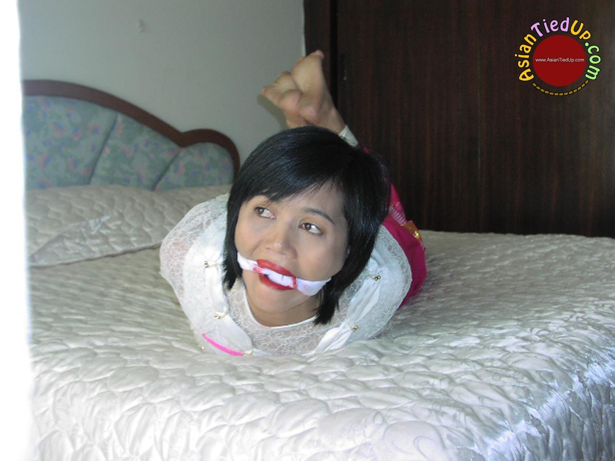 Bad Vacation of a Stupid Asian She is Left Hogtied and Gagged porn photo #428018074