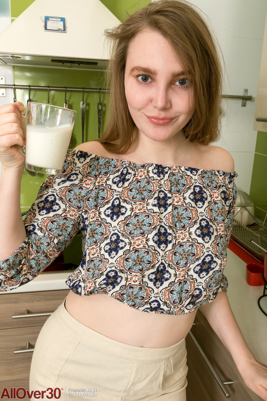 Over 30 lady with long hair reveals her all natural pussy in the kitchen porn photo #426978225