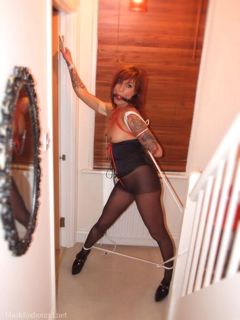 Ball gagged: Redhead girls are bundled up and tied up in different pantyhose.