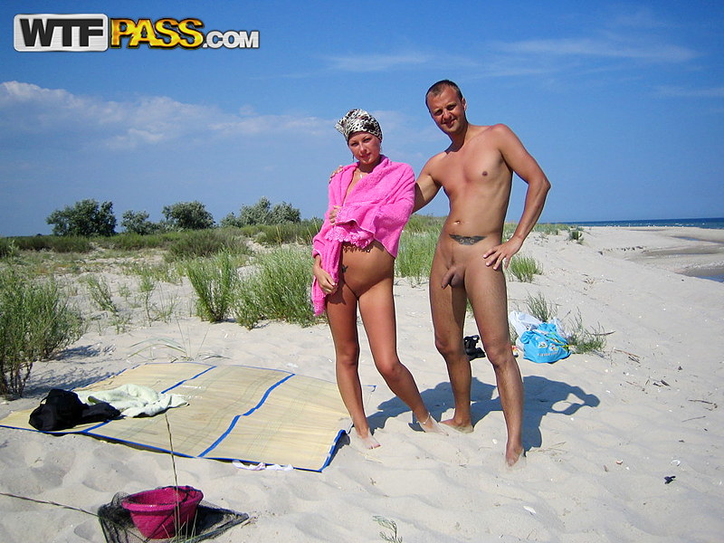 Blonde girl Adele and her boyfriend have sexual intercourse on a deserted sandy beach.