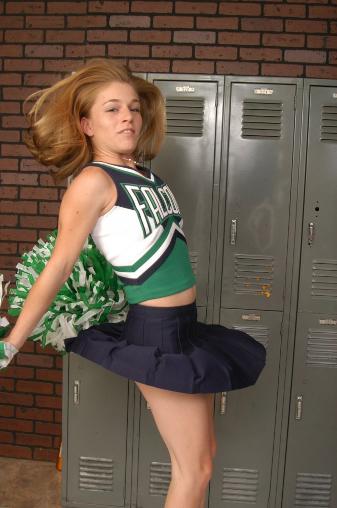 Teen cheerleader gets totally naked in front of change room lockers porn photo #422725426