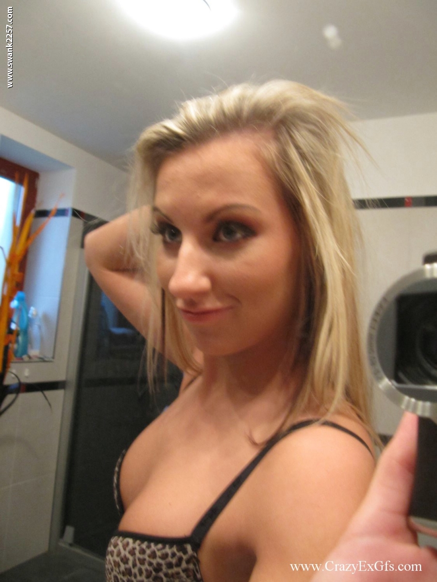 Blonde amateur gets totally naked while taking self shots in a bathroom mirror porn photo #427280007