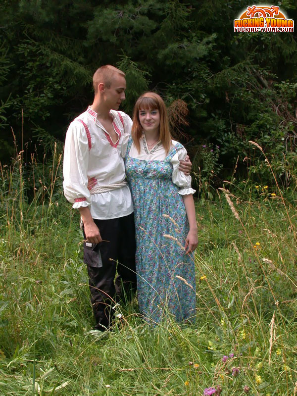 Russian teen with red hair rides her boyfriend's cock during sex in long grass Porno-Foto #428682593