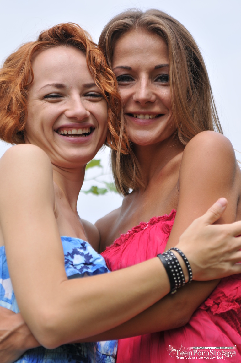 Young lesbians Nastya & Foxy gets naked on blanket in a field foto porno #427522185