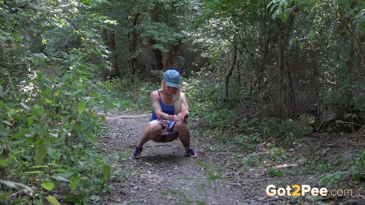 Gorgeous blonde pissing in the forest for Got2Pee porn photo #425361321
