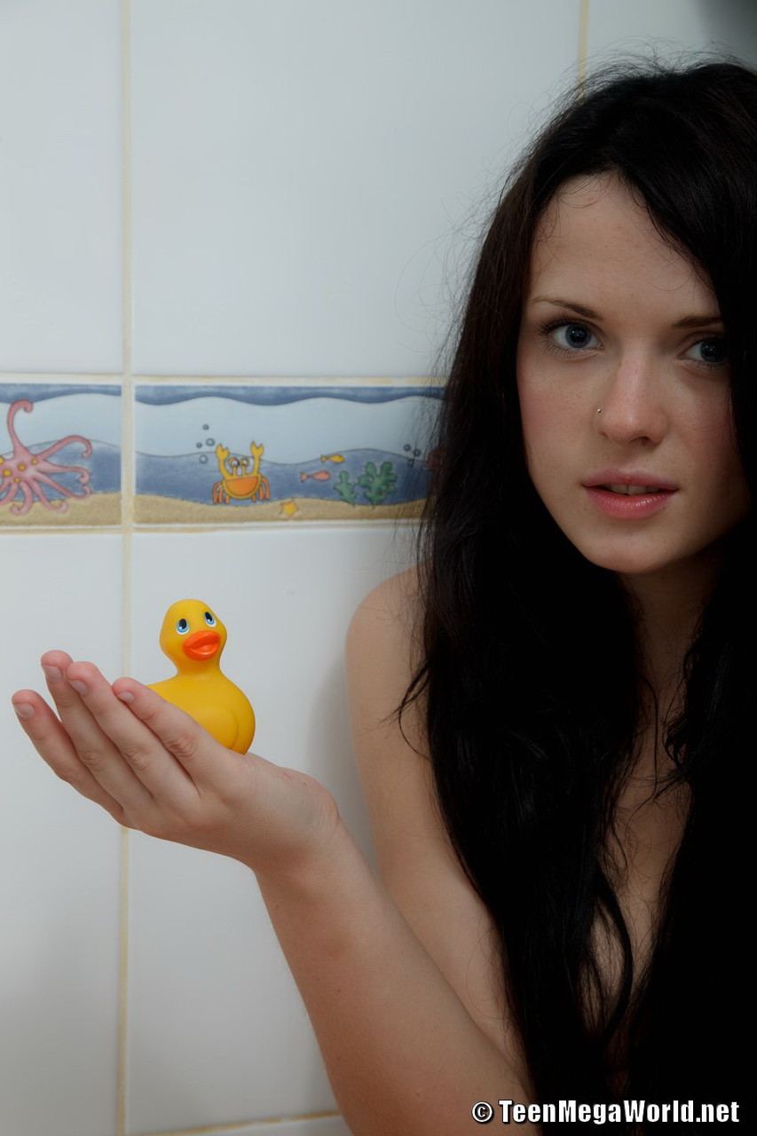 Dark haired teen Silver holds a rubber duckie while naked in the shower foto pornográfica #427055747
