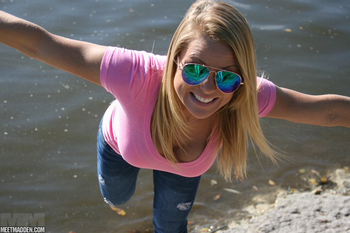 Blonde amateur exposes her lace underwear during waterside walk in blue jeans photo porno #425334810