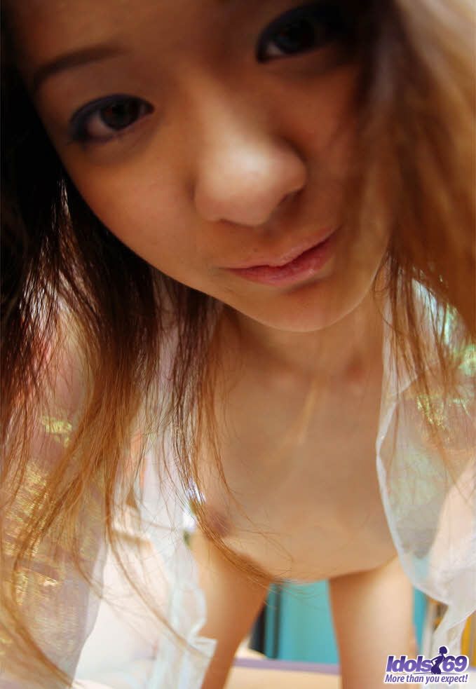 Japanese Solo Girl Izumi Exposes Her Bush While Changing Thongs