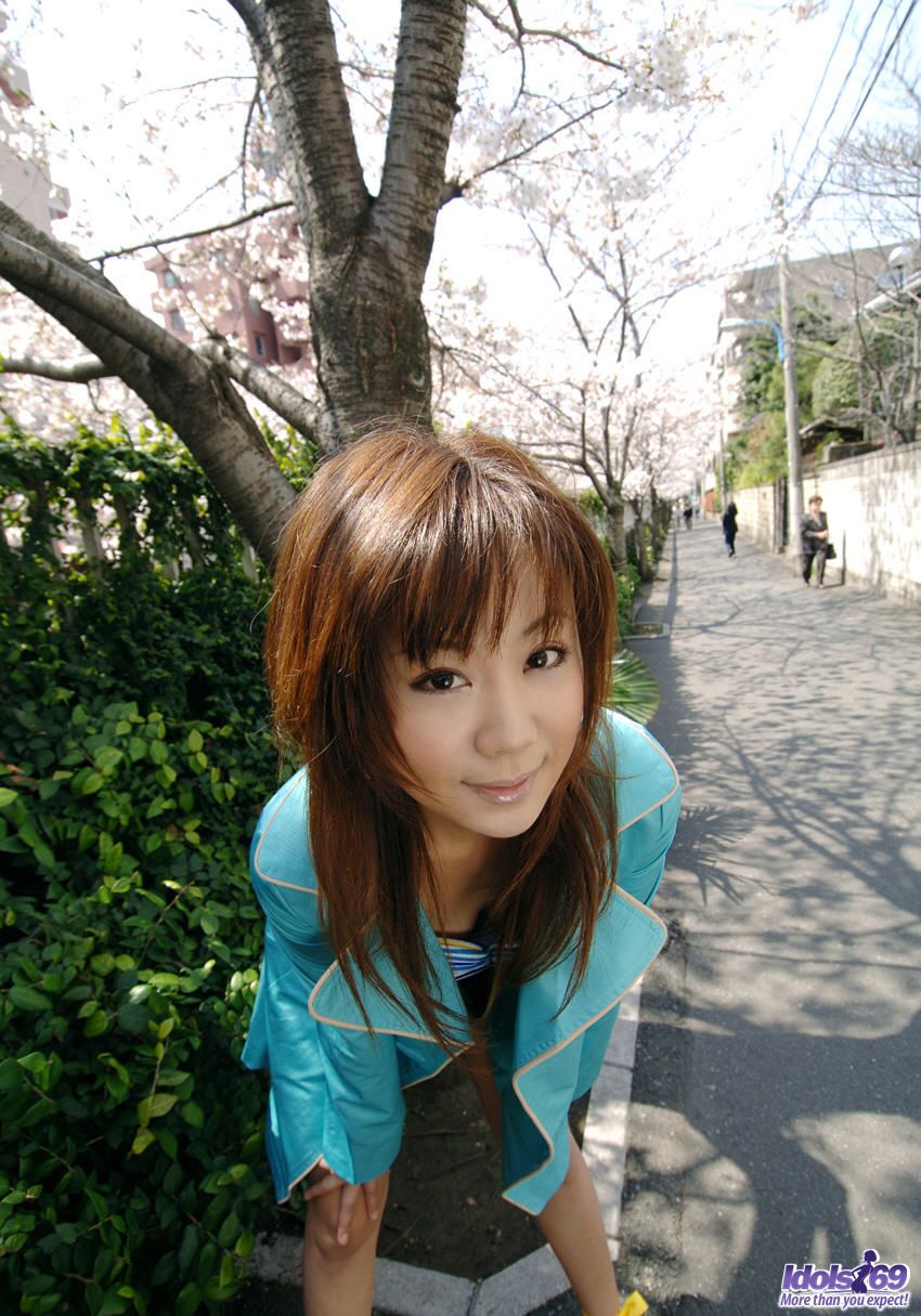 Asian cutie Maki Hoshino flashes on a sidewalk before exposing herself indoors photo porno #423653577