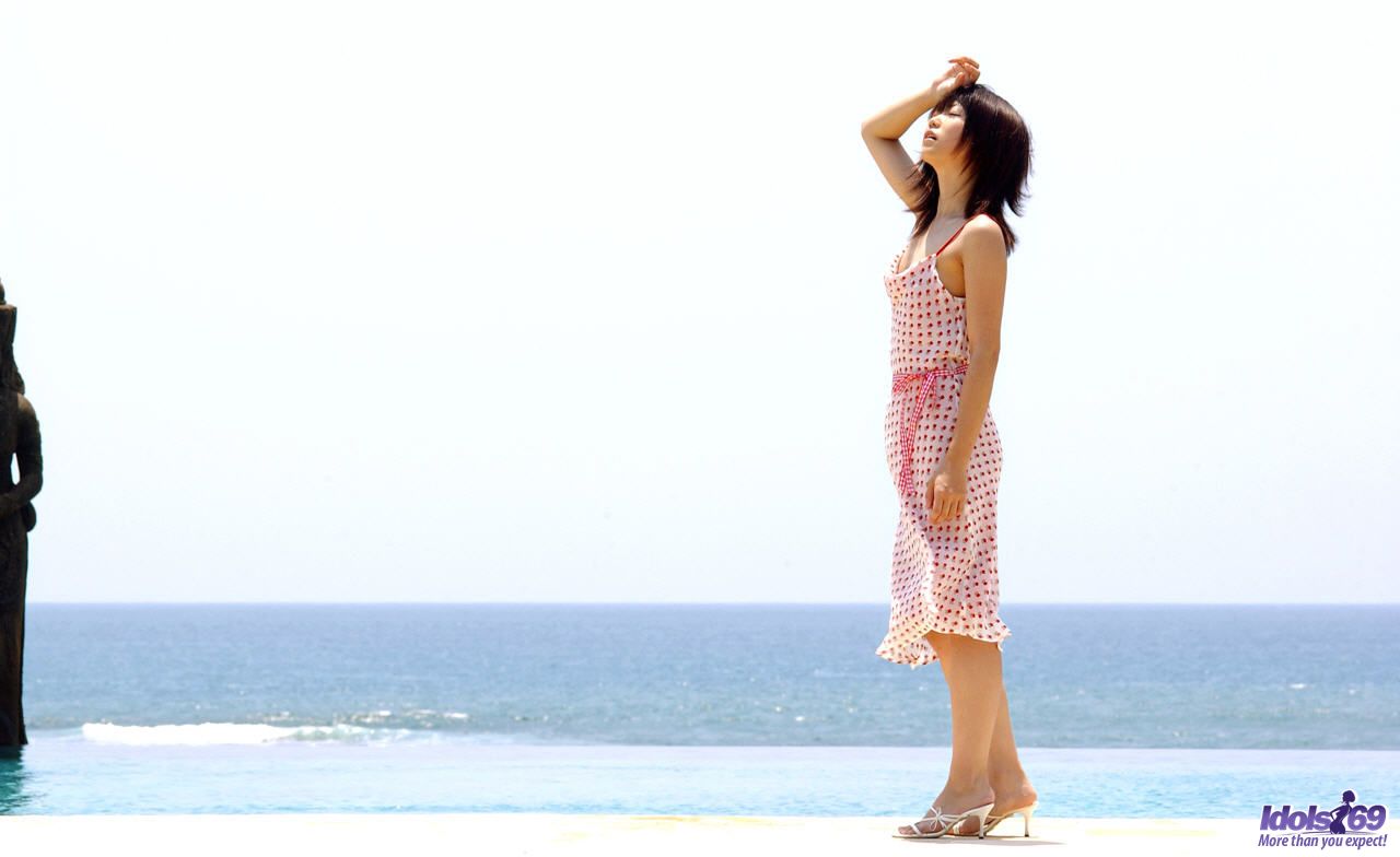 Young looking Japanese girl Saki Ninomiya gets naked with ocean behind her porno fotoğrafı #424241737