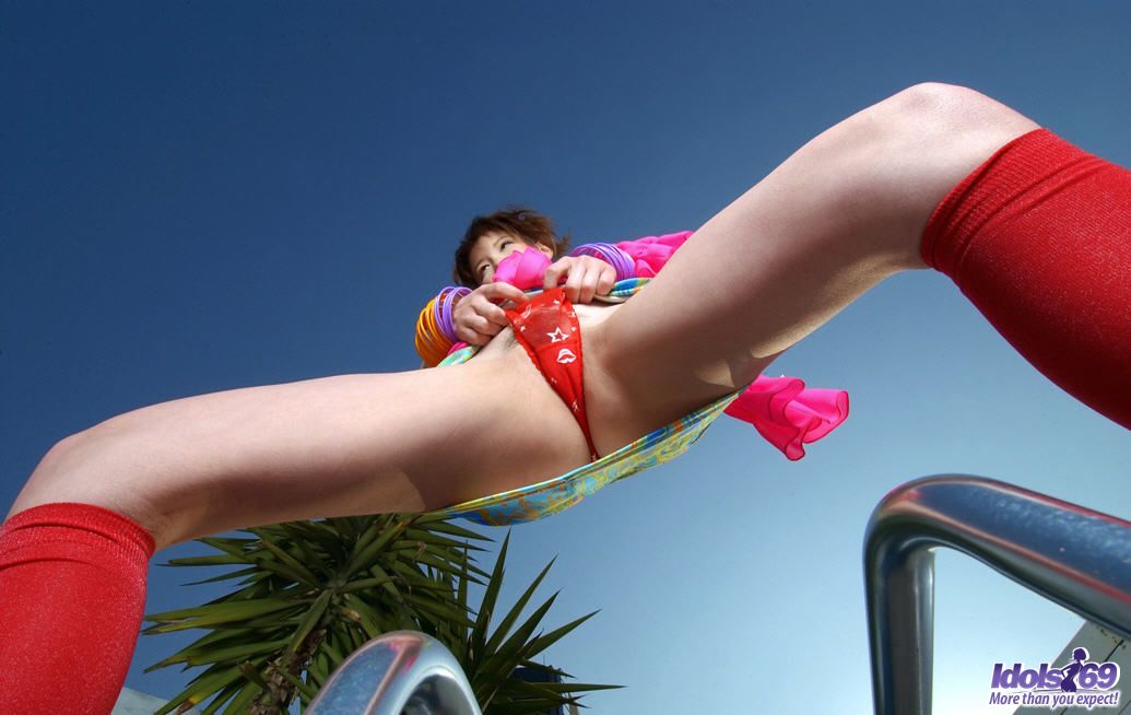 Japanese girl Akane Sakura exposes her upskirt underwear near a backyard fence porn photo #426787687